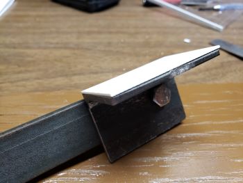 .040 styrene shim for cutting arm base