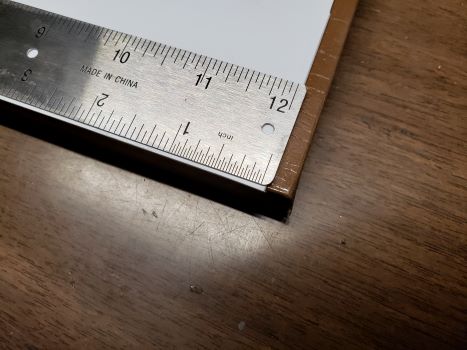 other end of ruler on board