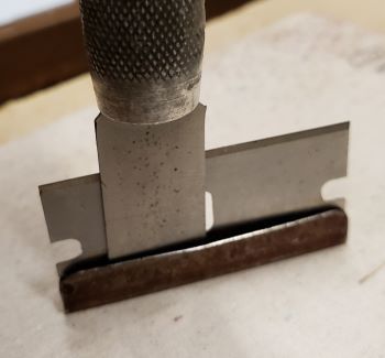 use razor knife to loosening stiffener